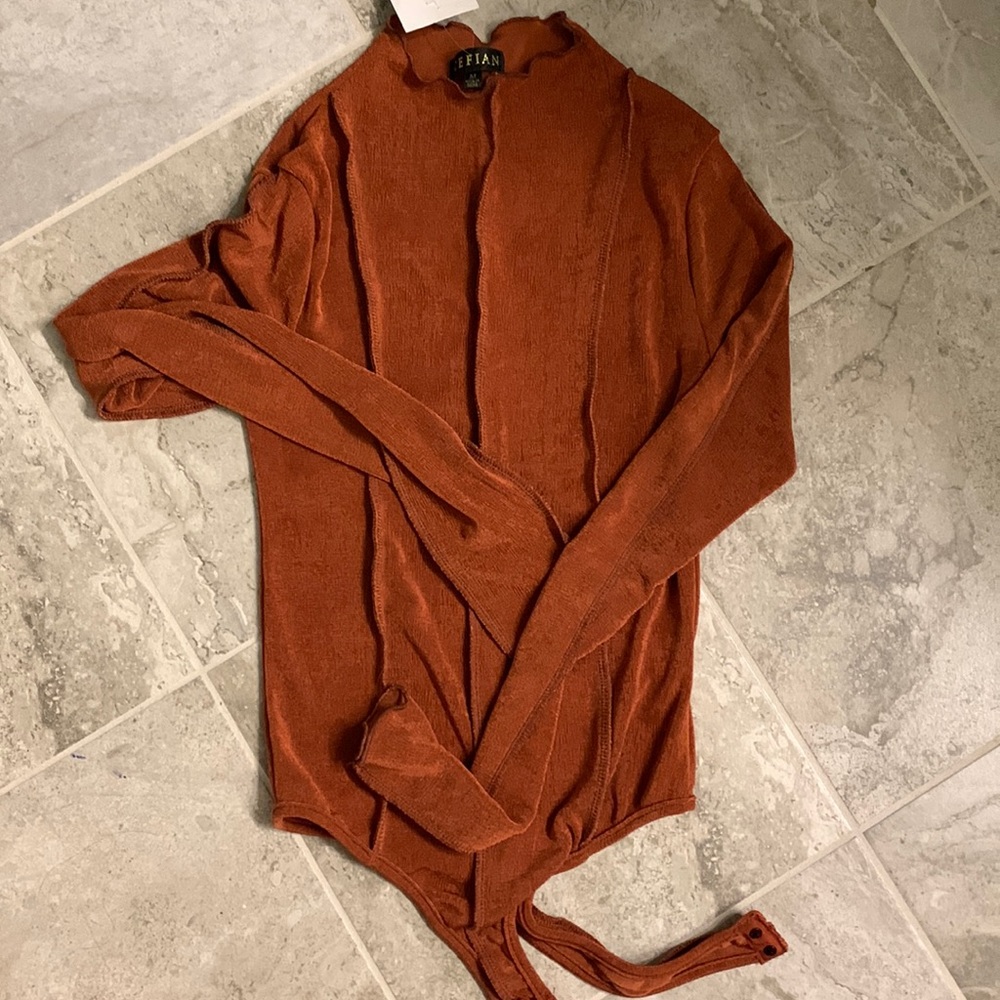 NWT specialty boutique bodysuit.